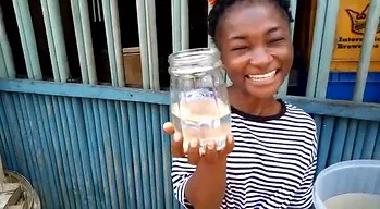 young boy happy to have disinfected water