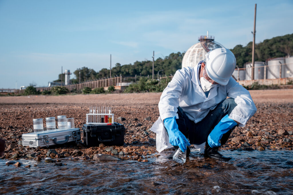 scientist wearing protective uniform and glove